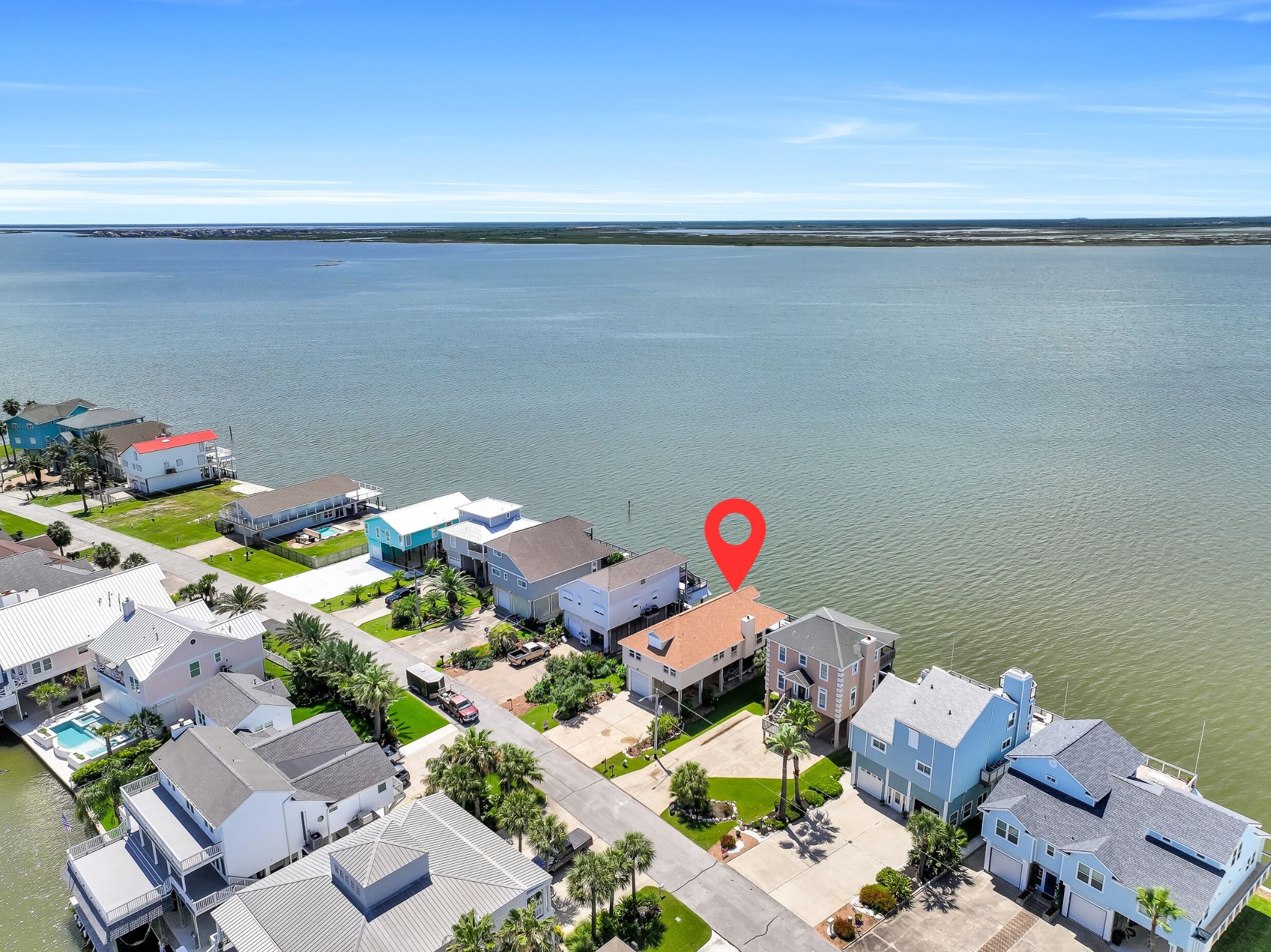Unlike many waterfront properties, this location offers expansive open-water frontage with unobstructed views stretching for miles across Jones Bay. The wide bay exposure creates a feeling of privacy, space, and connection to the water that's increasingly difficult to find along the Texas coast.
