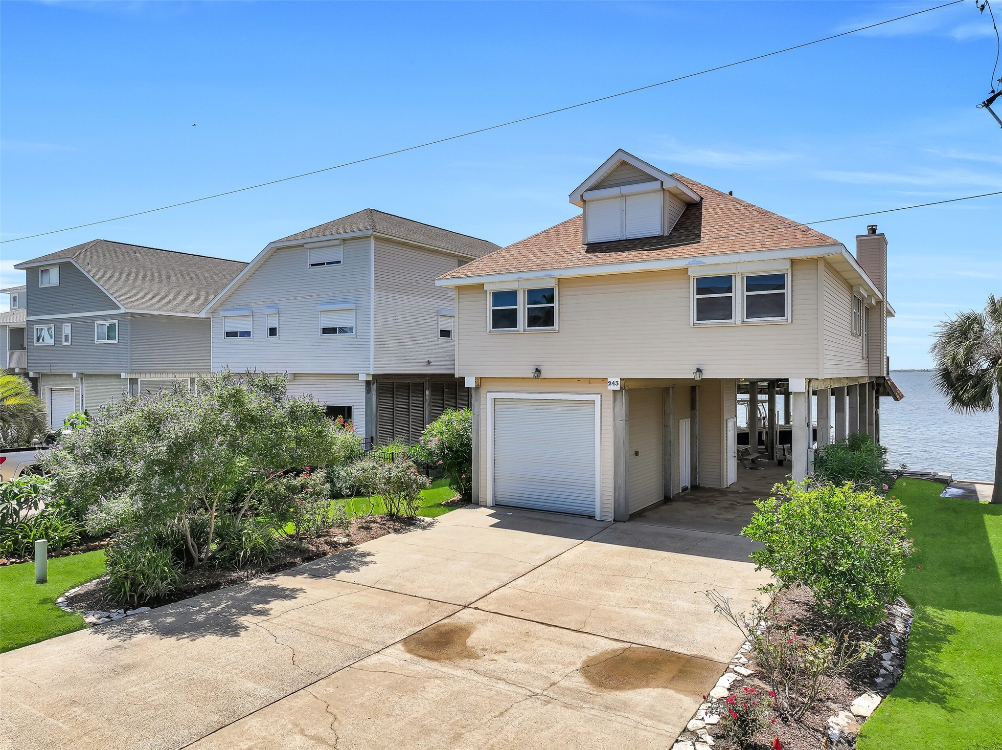 Life on Tiki Island offers the best of both worldsrelaxed waterfront living with convenient access to Galveston and the Houston area via I-45. This elevated home features storm shutters, generous parking, a one-car garage, and a sought-after location on beautiful Isles End.