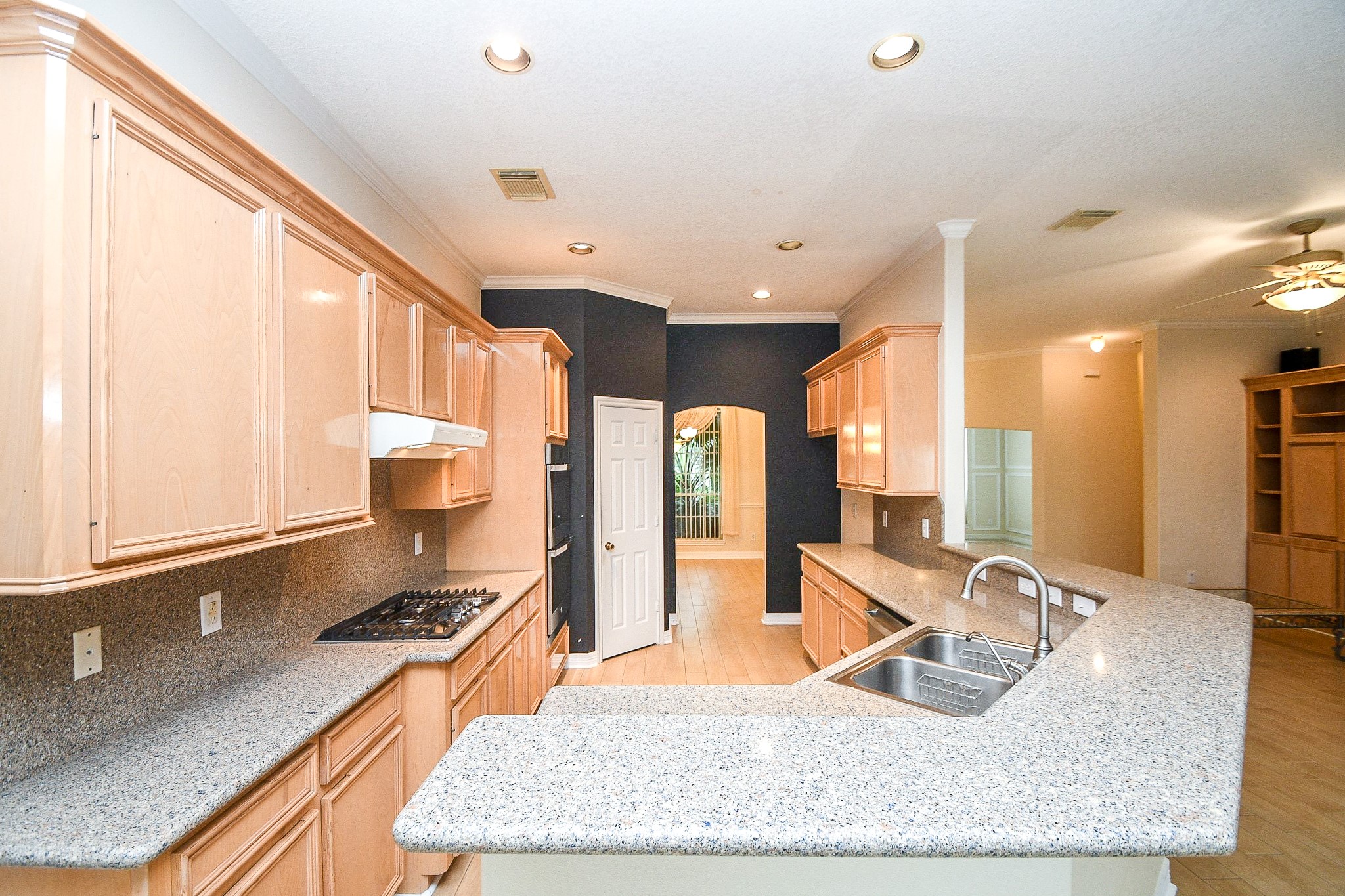 Expansive kitchen with ample counter space and modern amenities.