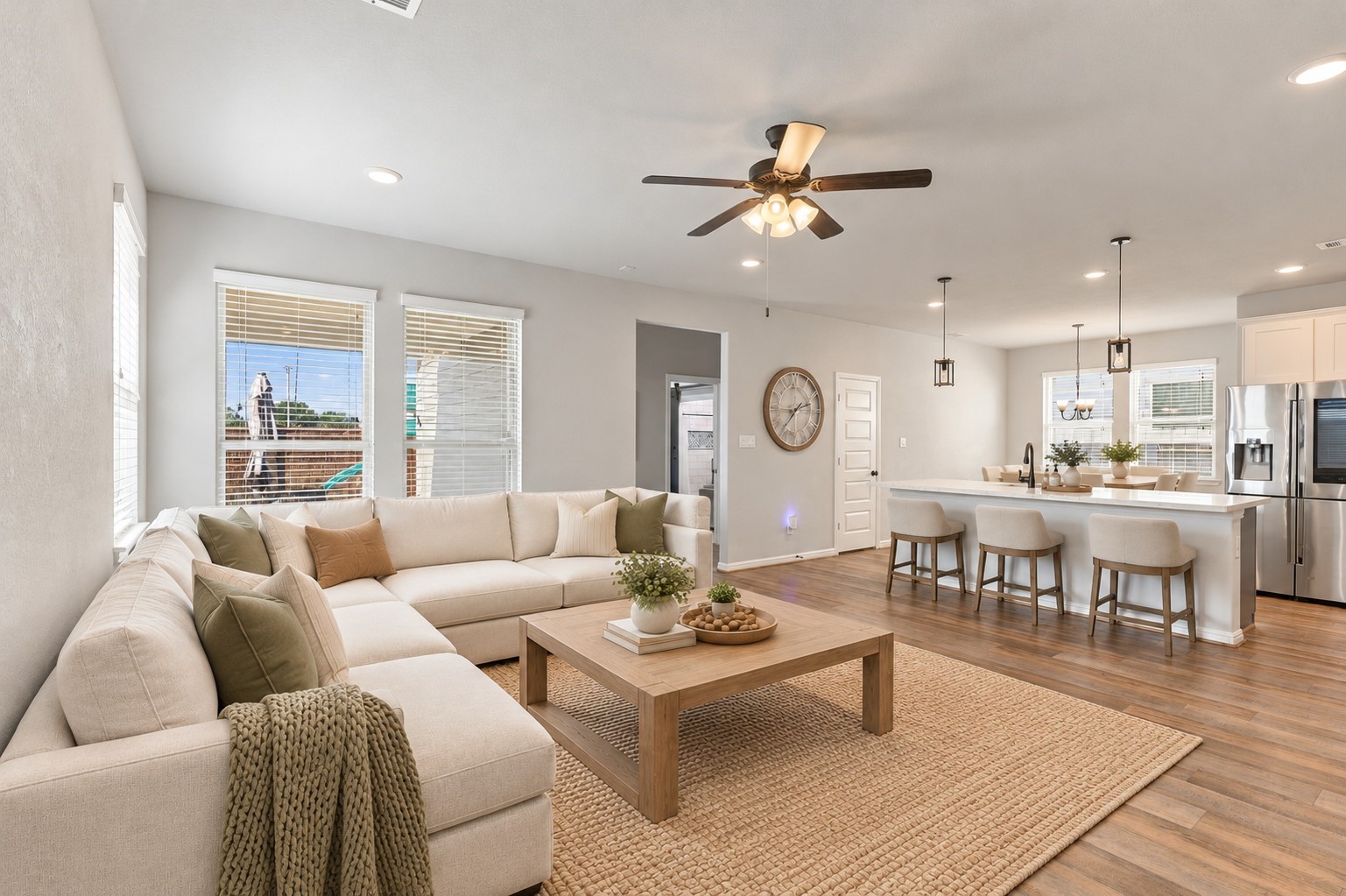 Seamless connection between the living room, kitchen, and breakfast bar enhances everyday functionality.**Virtually staged
