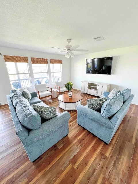 this is a three bedroom/two bathroom home with an open living and kitchen area