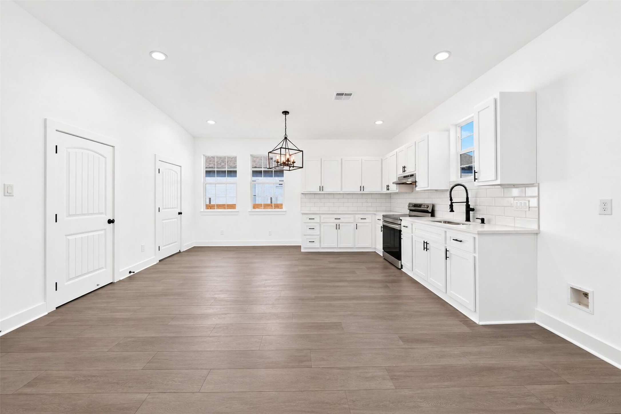 A kitchen equipped with contemporary and new appliances. A kitchen equipped with contemporary and new appliances.
