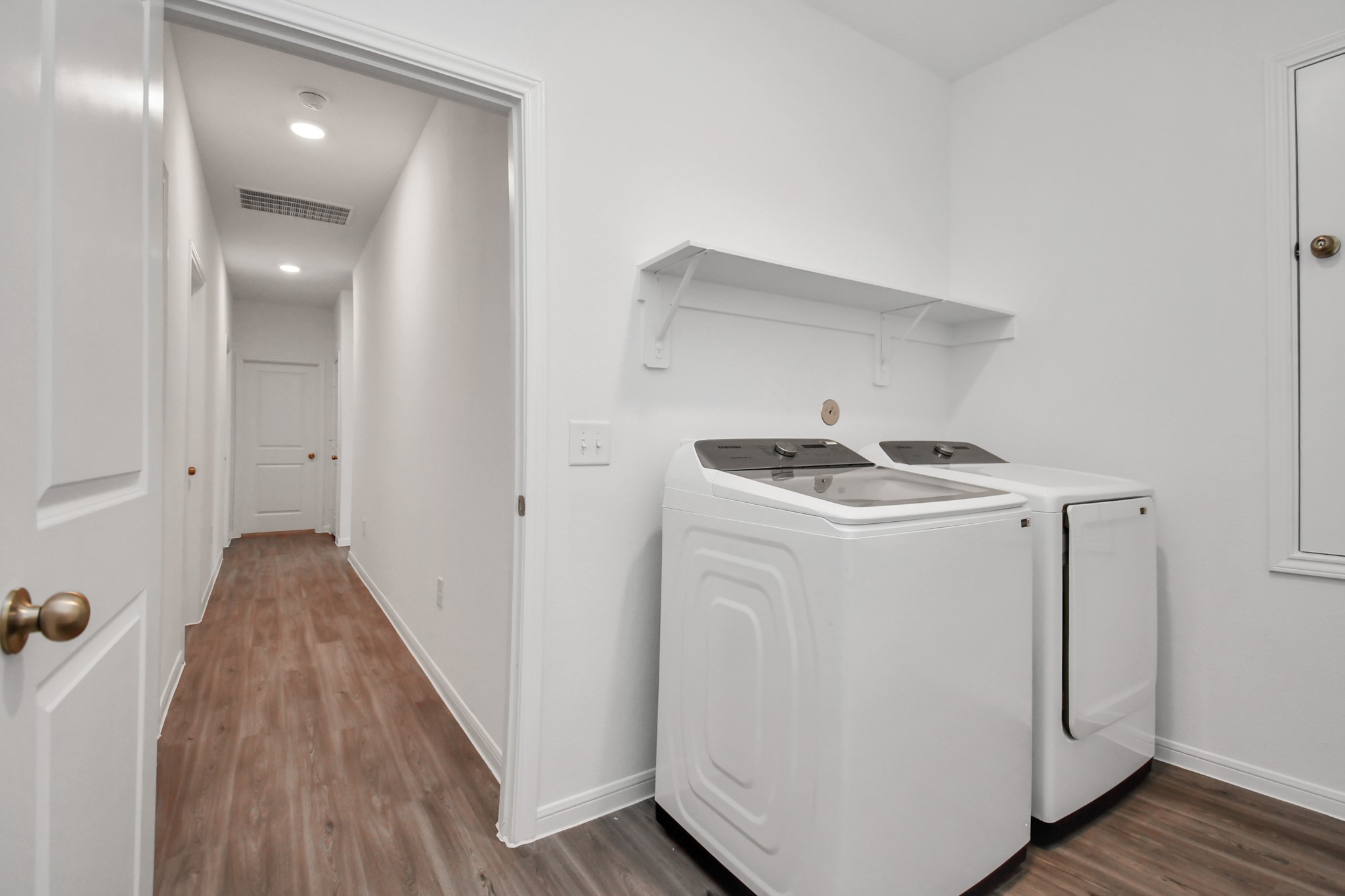 Home equipped with Washer and Dryer located in the utility room that is inside the home, with easy access from garage.