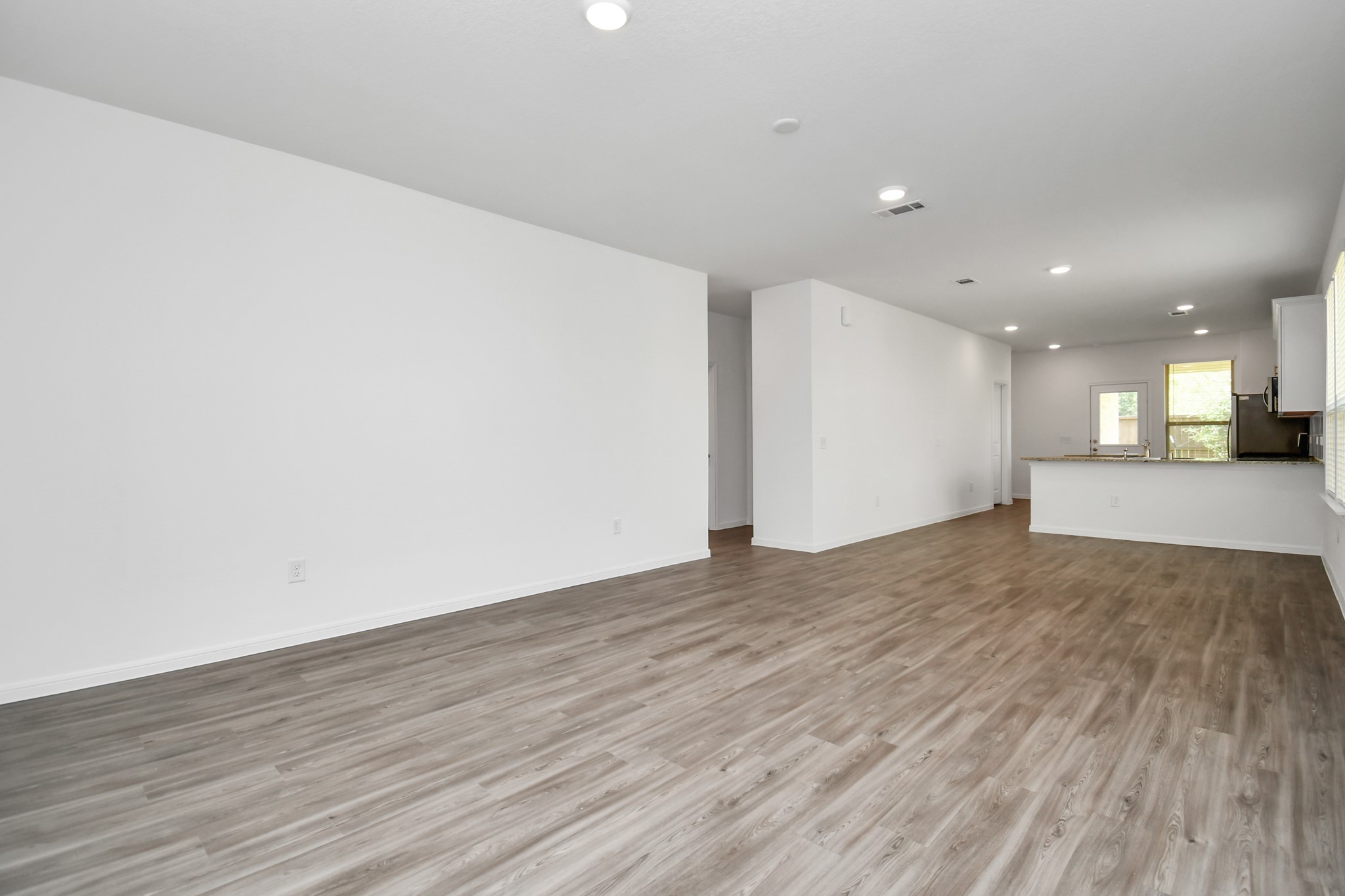 Another view of this amazing open floorplan with living/dinning area all in view of the kitchen.