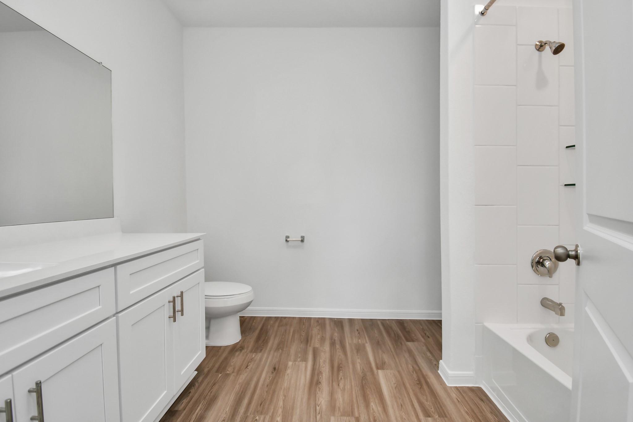 Master bathroom features a tub/shower combination.