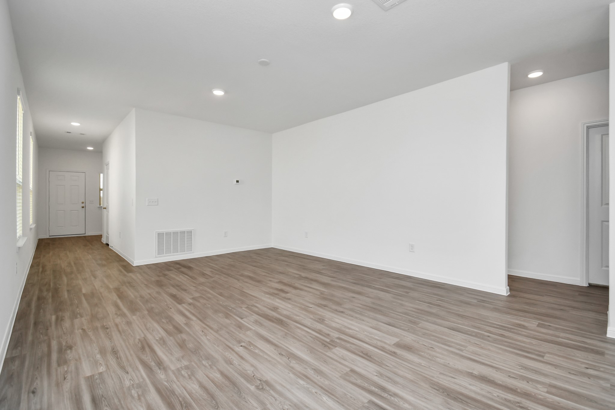 A view of the entry way with entry closet for more storage.