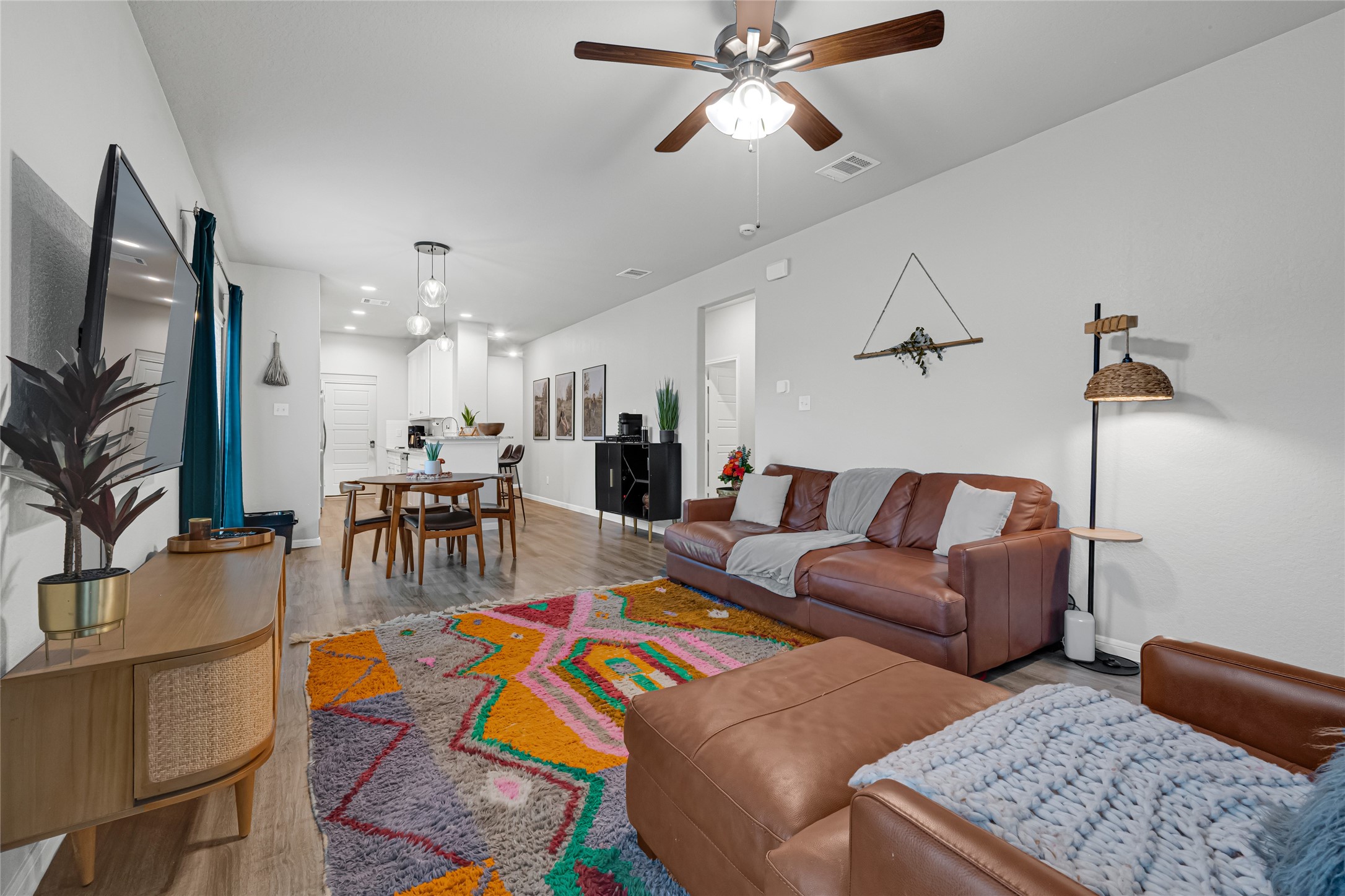 The open concept layout makes everyday living easy  from the living room to the dining area and kitchen, everything flows. Stylish finishes, natural light, and a layout designed for how people actually live.