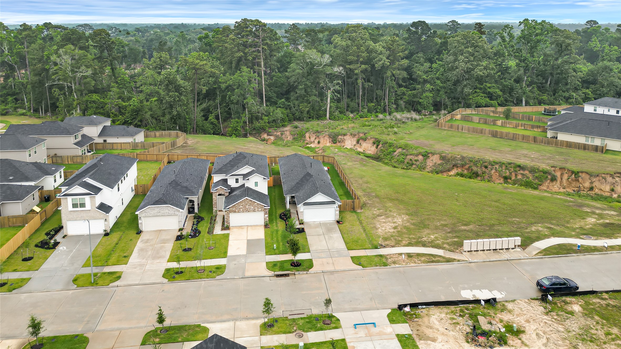 This home truly has it ALL and is BETTER than New with every imaginable upgrade bring your pickiest buyer and let them check off their boxes and offers a PRIVACY in a serene setting with no side or back neighbors and a wooded backdrop.