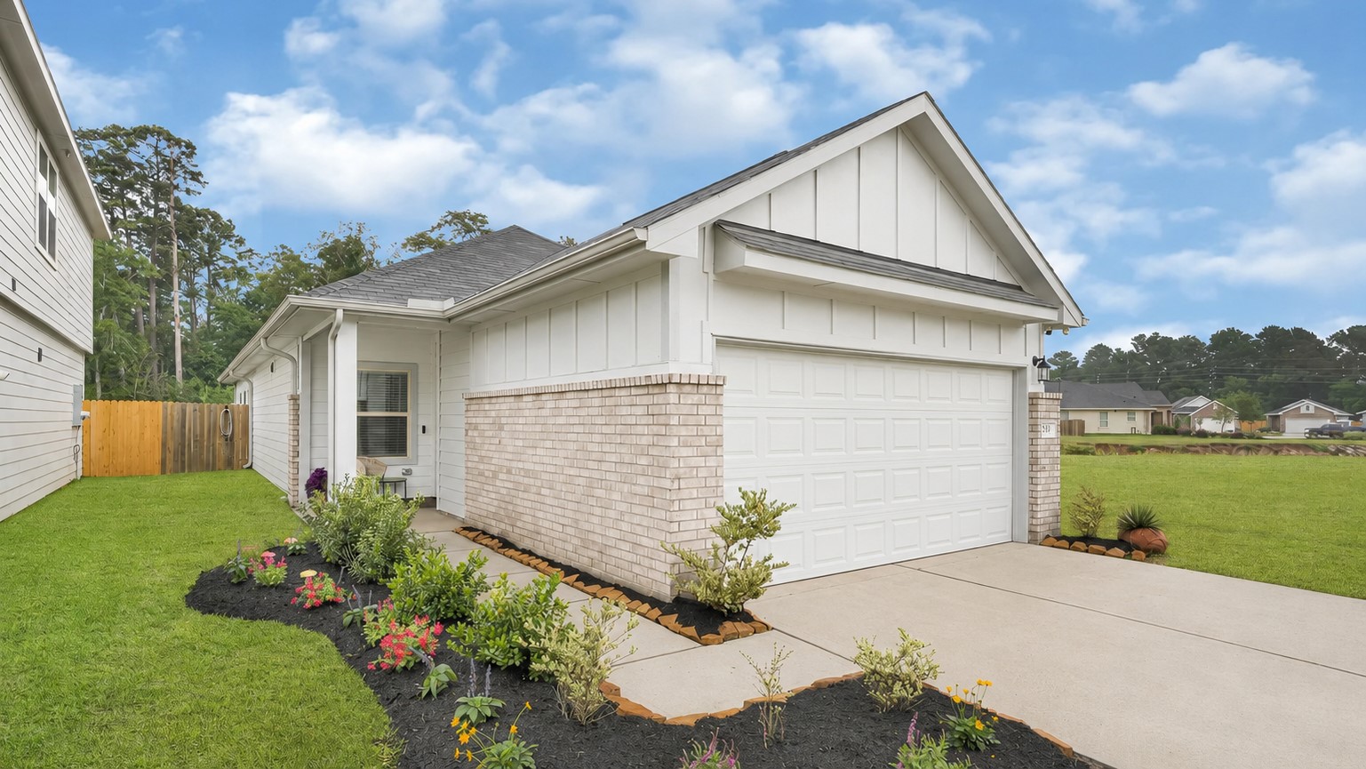 Discover modern living in this stylish single-story home featuring sleek white James Hardie fiber-cement siding, Cemplank fiber-cement soffits, fascia and trim and a spacious two-car garage, and beautifully landscaped gardens. Set on a premium lot with no rear or side neighbors, enjoy ultimate privacy and generous outdoor space amidst lush greenery.