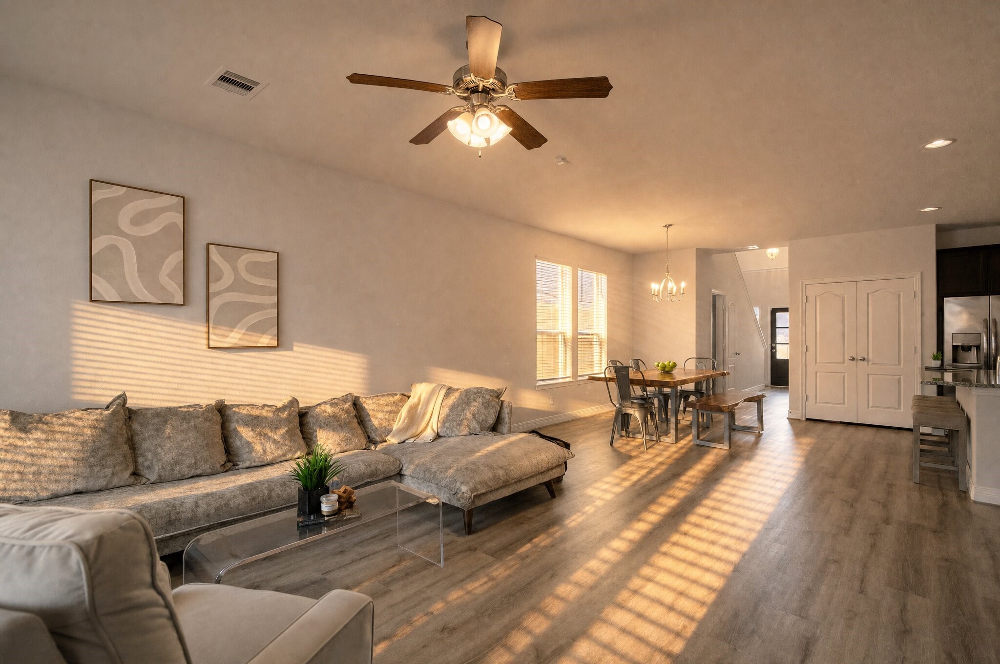 Everyday life flows naturally through your open living and dining space, giving you plenty of room to gather, dine, and unwind together. This photo has been digitally edited.