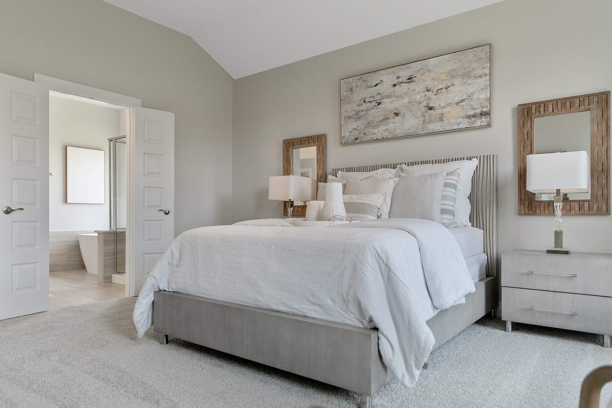 Generously sized secondary bedrooms featuring spacious closets, soft and inviting carpeting underfoot, large windows allowing plenty of natural light, and the added touch of privacy blinds for your personal retreat.