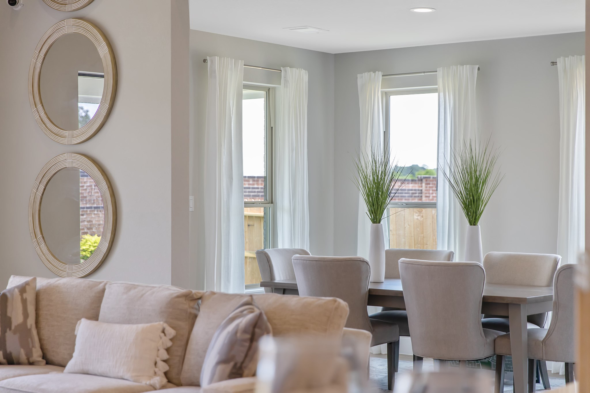 Make memories gathered around the table with your family and friends! This spacious dining room features elegant flooring, custom paint, and adjacent to family room and kitchen for open concept feel.