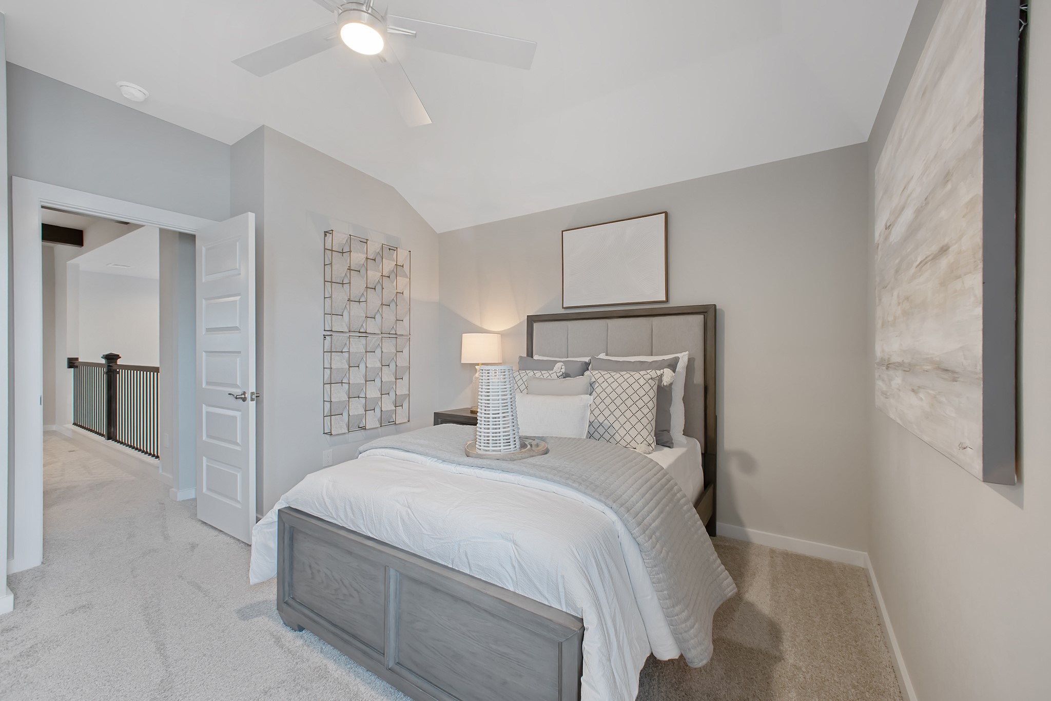 Generously sized secondary bedrooms featuring spacious closets, soft and inviting carpeting underfoot, large windows allowing plenty of natural light, and the added touch of privacy blinds for your personal retreat.