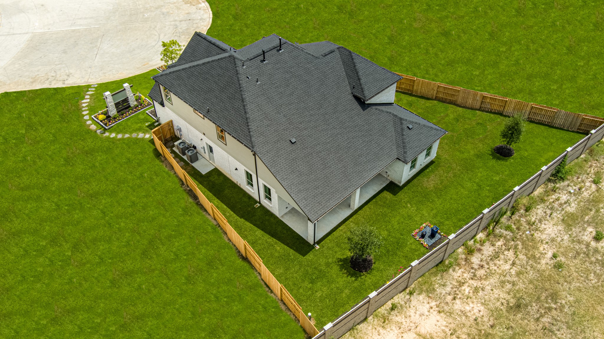Come and see this spacious backyard with its beautiful covered patio. There is plenty of room for the kids to play and adults to relax. Perfect for your outdoor living space, patio furniture, bbq pit, and so much more. The possibilities are endless!