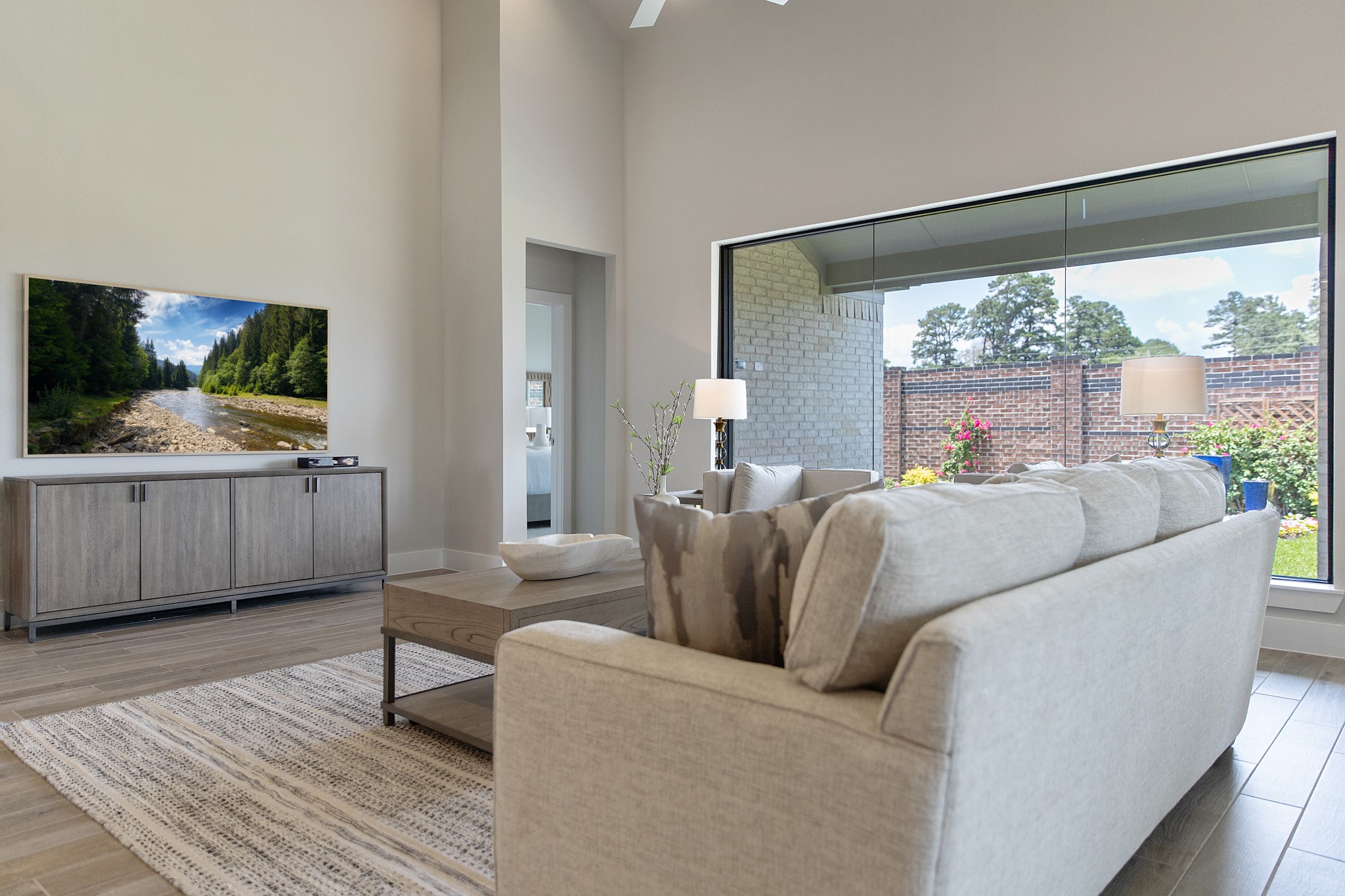 Take another glimpse into the heart of the home with this additional view of the family rooma sprawling space ready to accommodate all your gatherings.