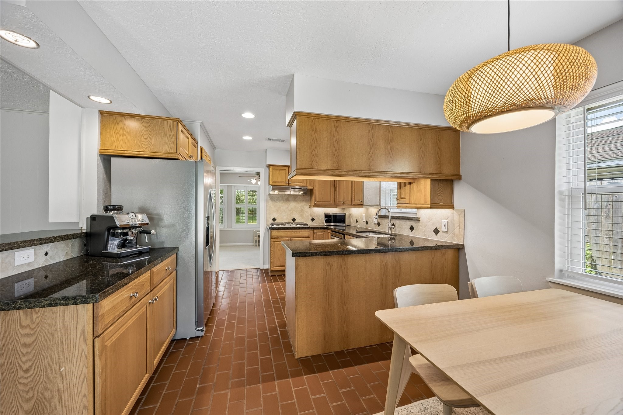 Kitchen has granite countertops, recessed lighting and soft-close drawers and cabinets. Kitchen has granite countertops, recessed lighting and soft-close drawers and cabinets.