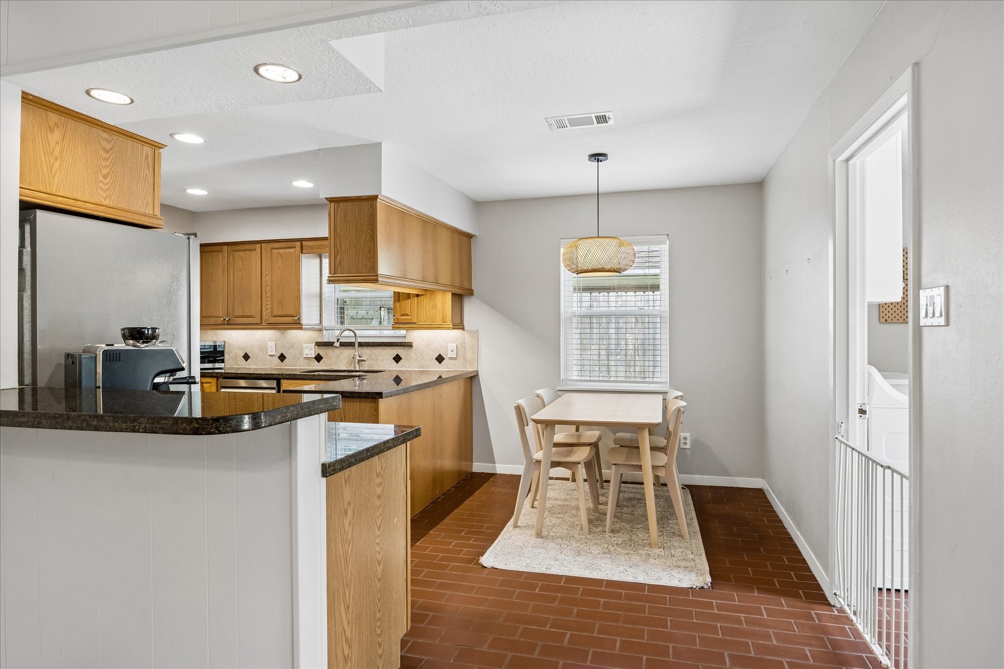 Breakfast area. The utility room is to the right.