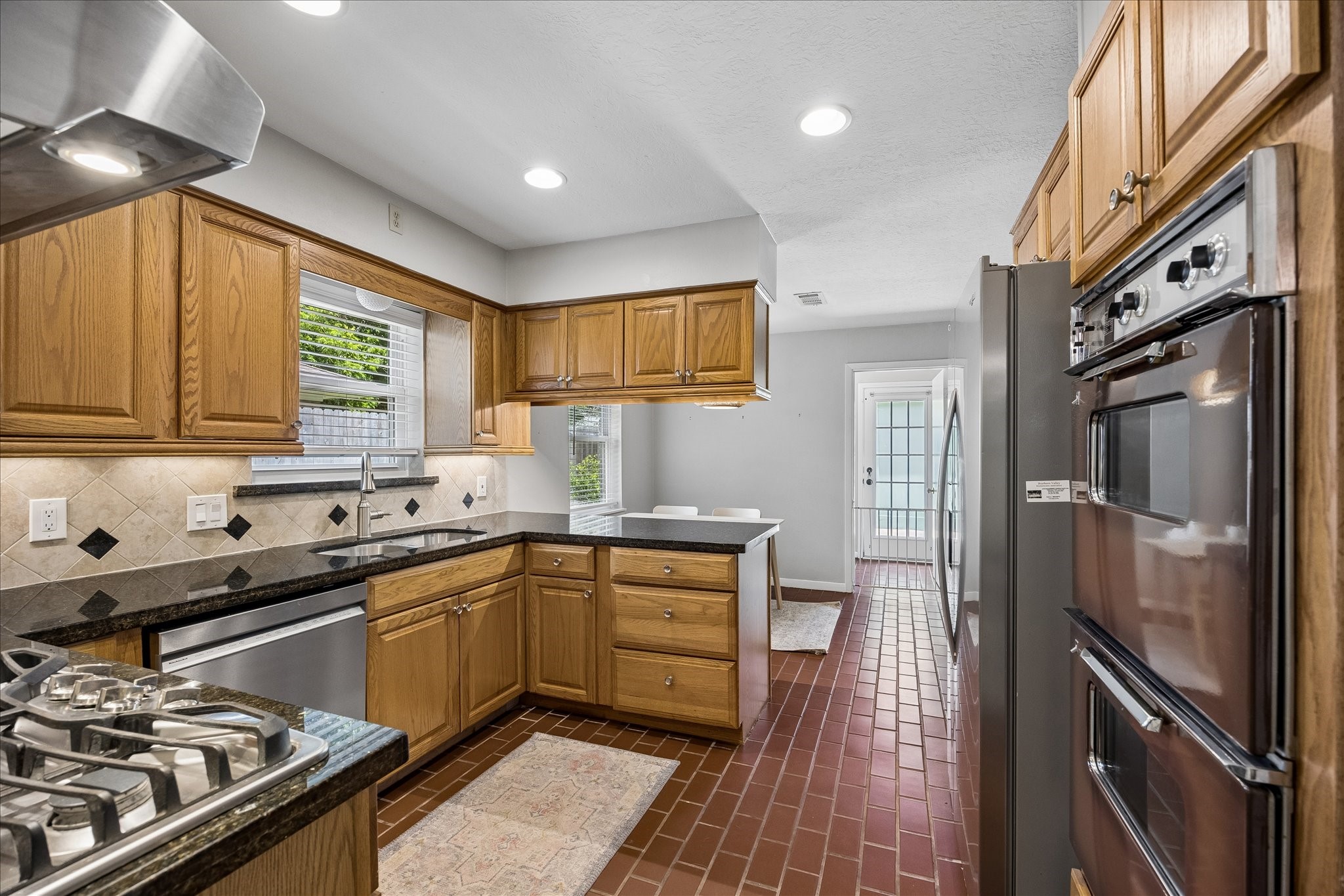 What a great kitchen! Lots of counter space and storage.  Refrigerator stays with the home!