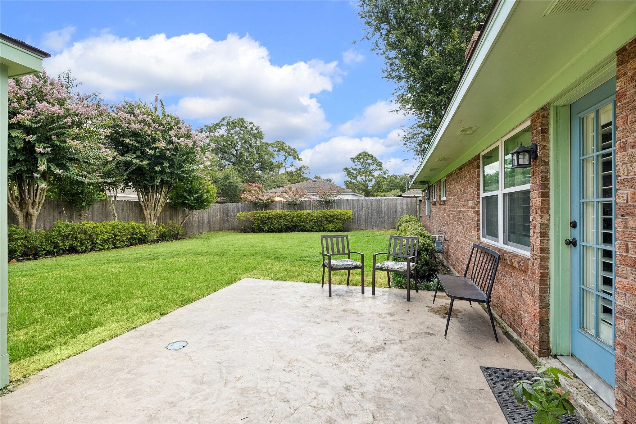 Backyard has a nice size patio and green area. Backyard has a nice size patio and green area.