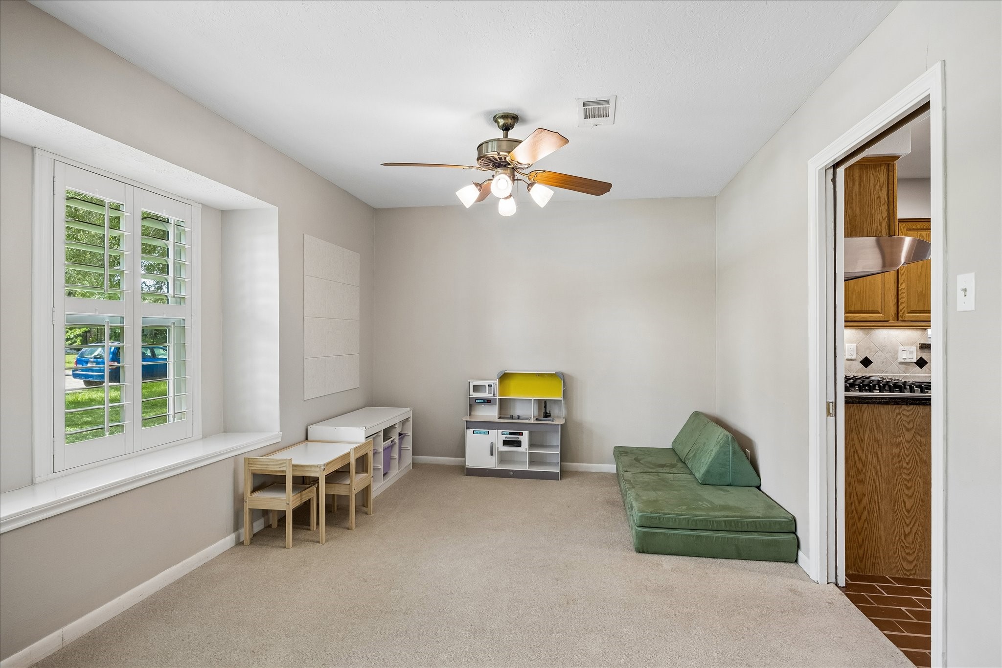 Dining Room is off of the kitchen. Sellers are using area for a play room.