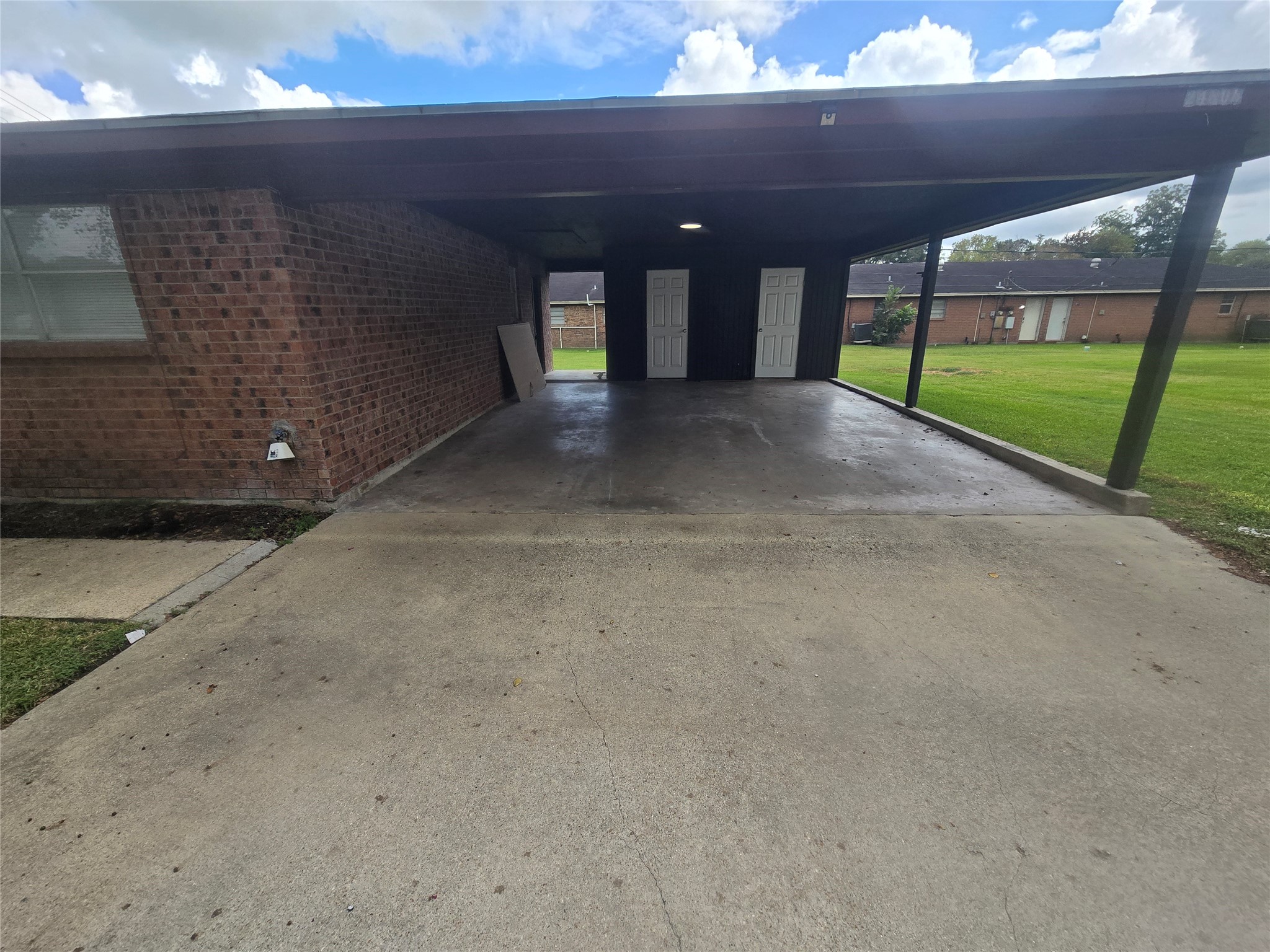 covered carport and built in storage area