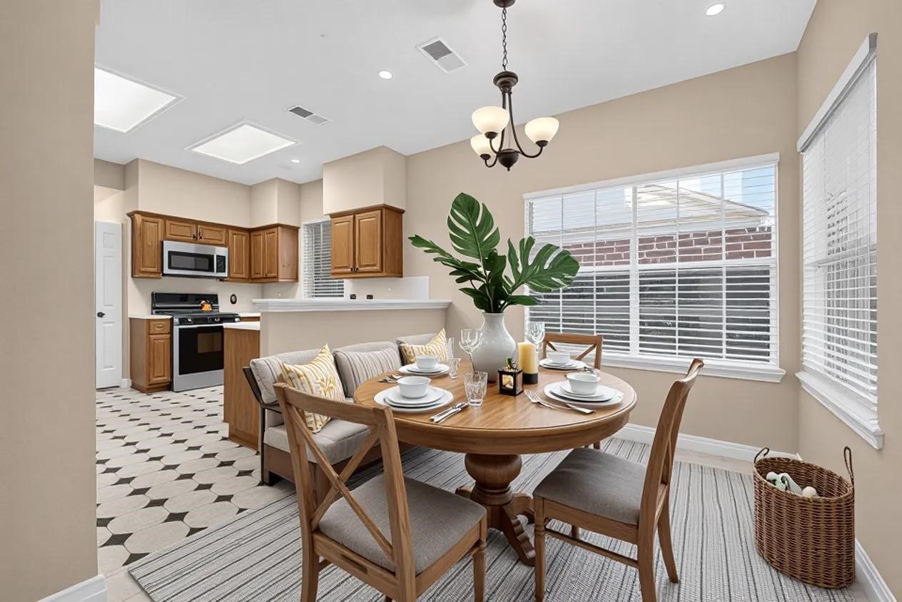 The breakfast room also has lots of windows for that natural light.  Virtually staged photo.