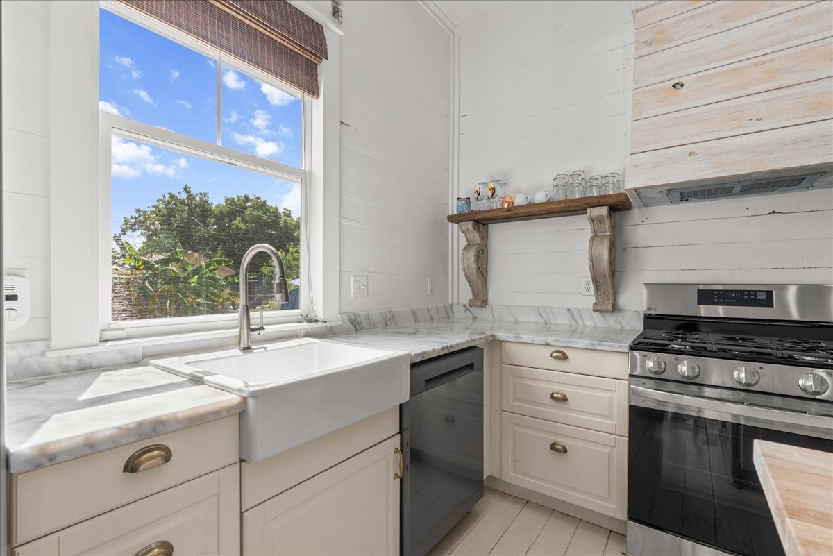 Bright kitchen workspace with window over the sink.
