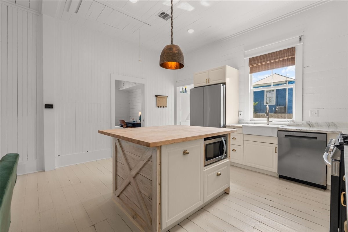 Open kitchen layout with island and easy access to living areas.