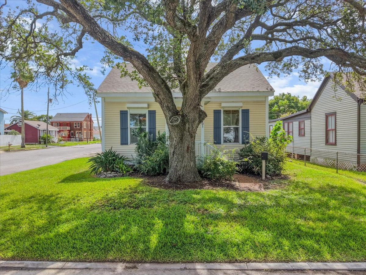 Front exterior showing the homes classic island character.