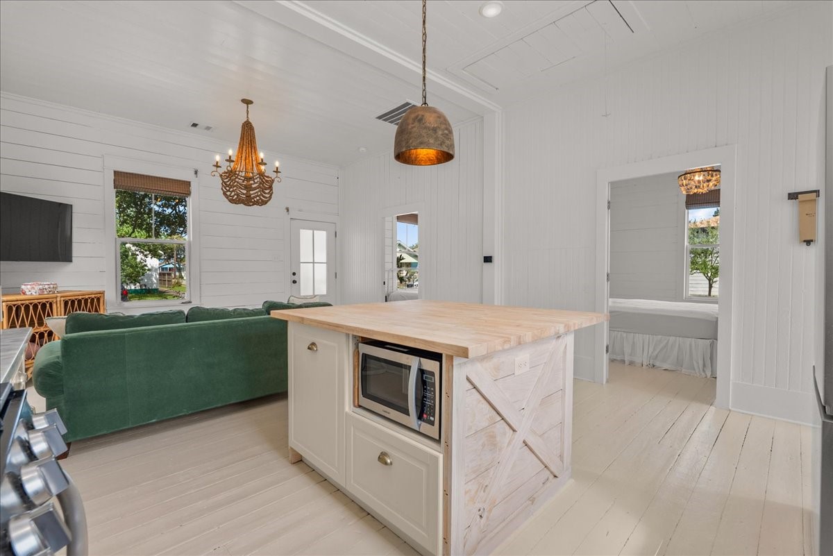 Center island provides extra prep space and casual seating.
