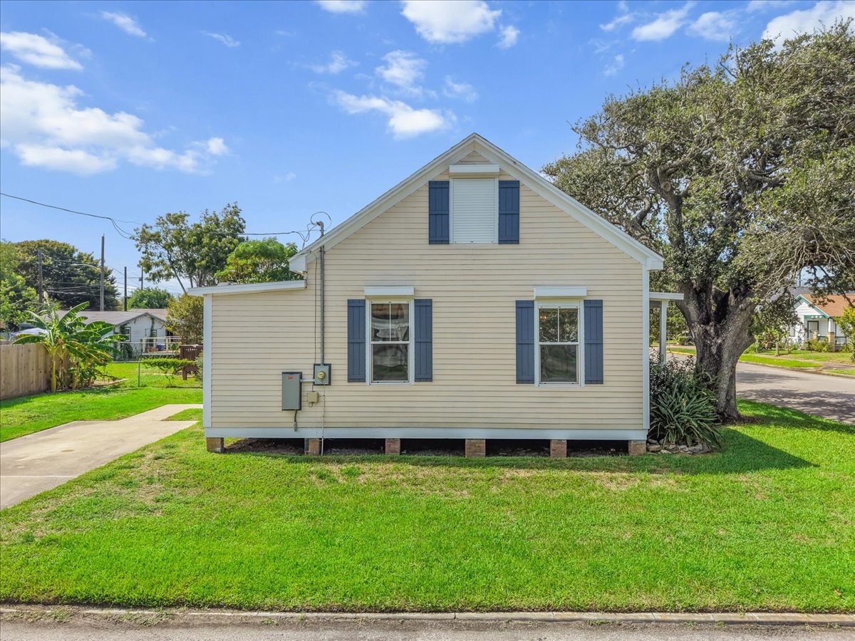 Side/rear exterior with easy access around the property.
