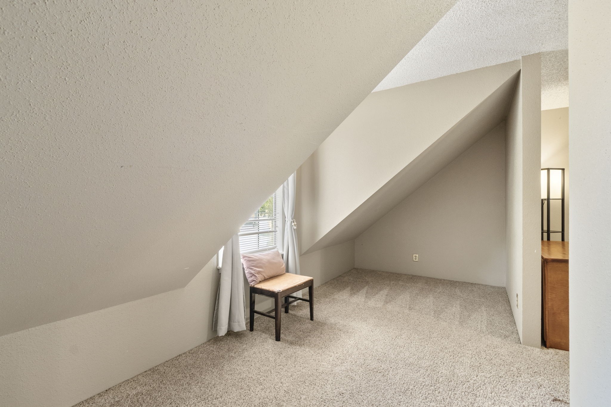 Two large upstairs bedrooms offer great space for sharing, with two side nooks that can be used for flexible storage, a home office or study area, or a cozy reading or gaming space filled with natural light.