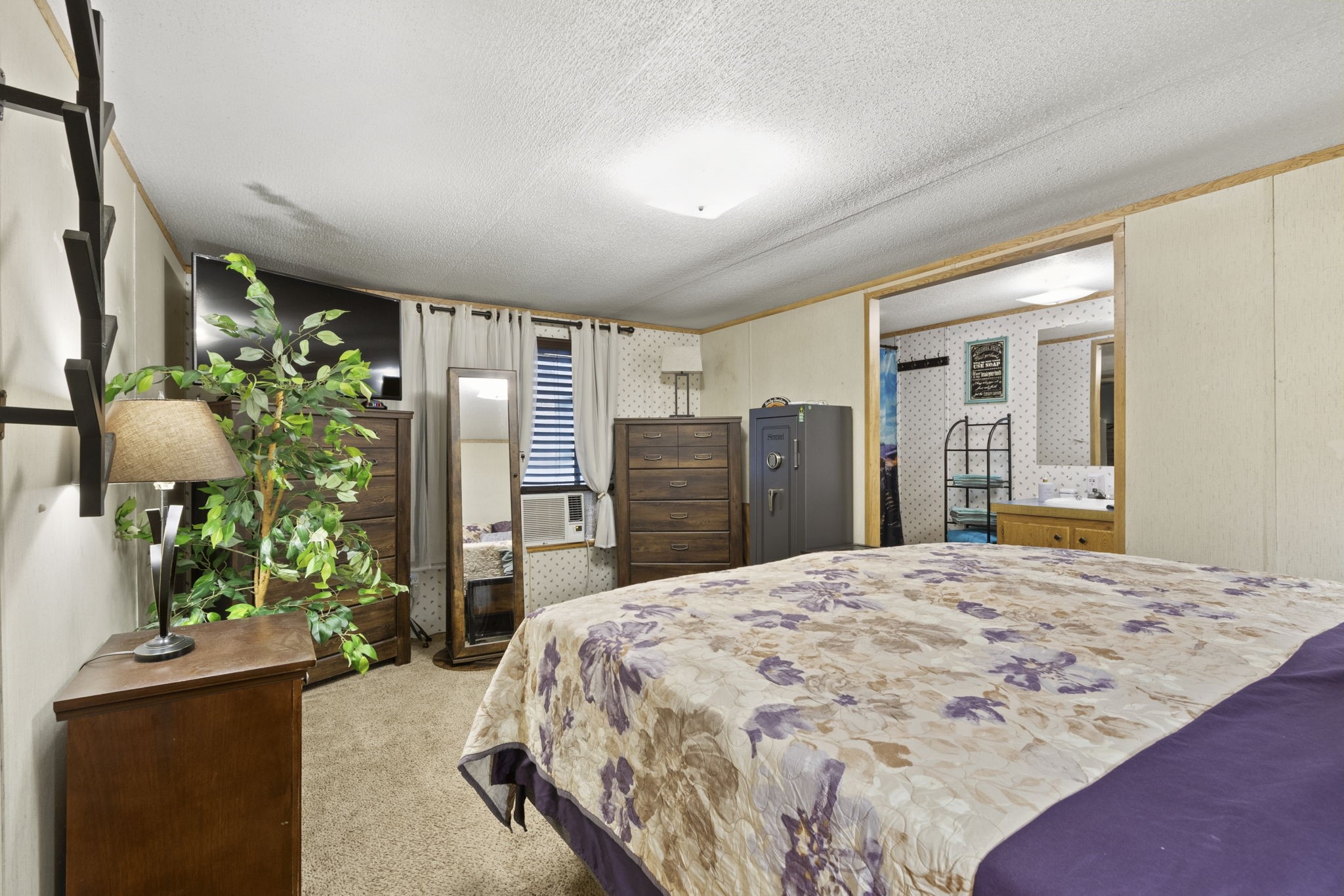The nicely sized primary bedroom offers a private bathroom for added comfort and convenience.