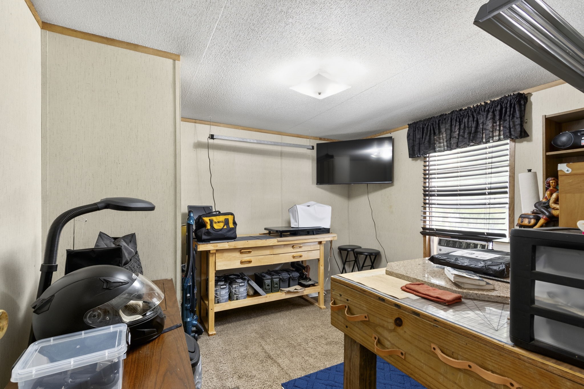The second bedroom offers comfortable space and a dedicated closet for storage.