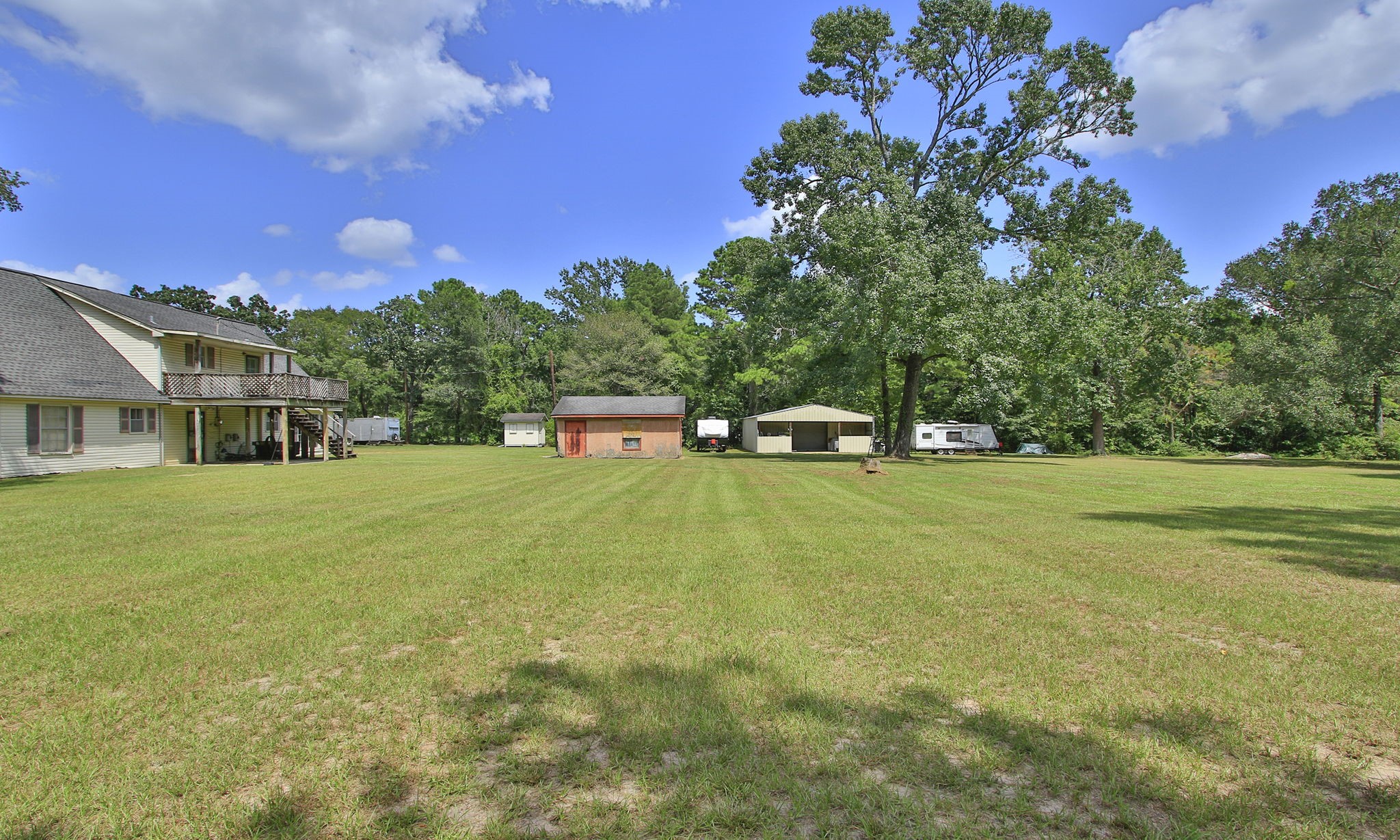 Land, land, and more land! There is plenty of space to bring the whole family, enjoy the outdoors, and create the country lifestyle you have been dreaming of.