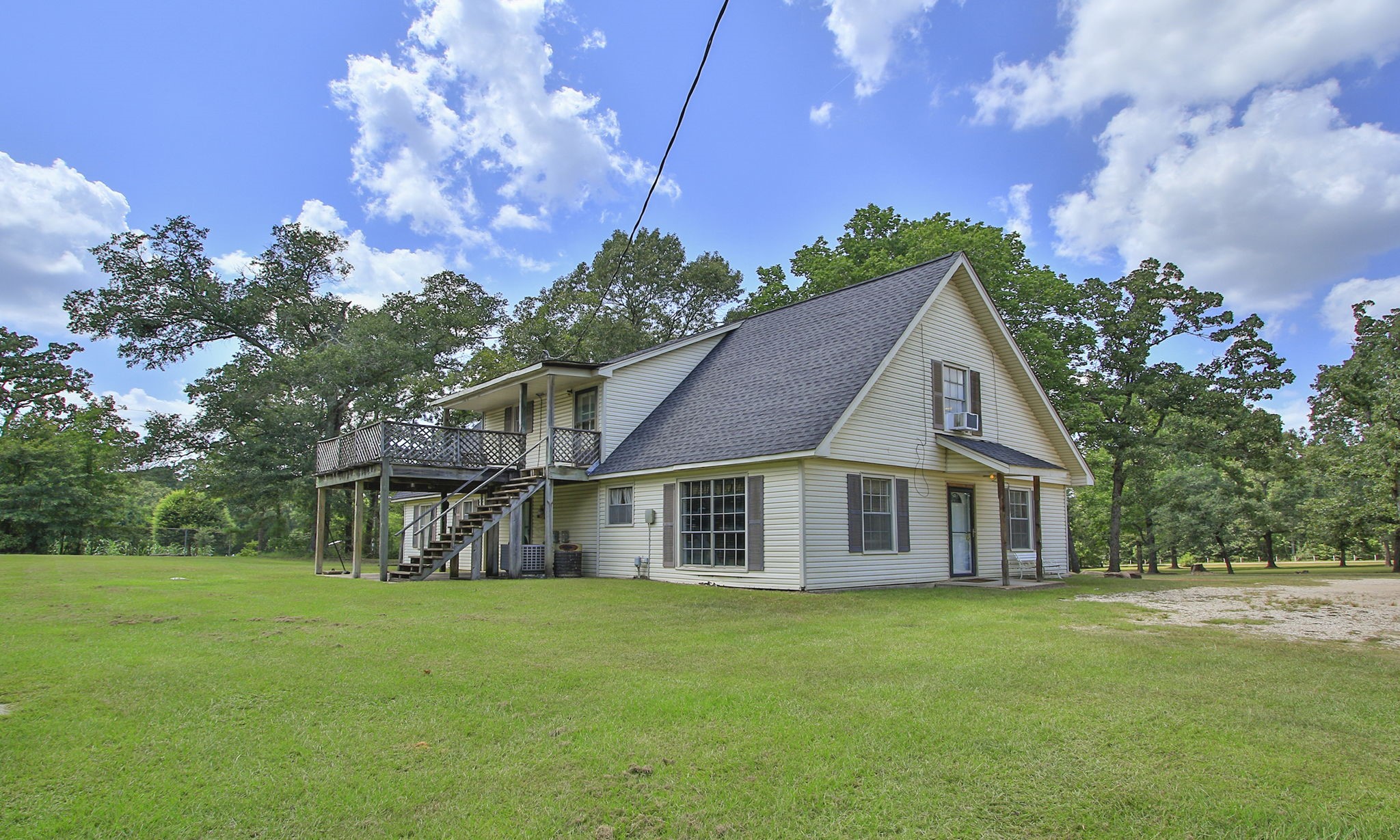 Can you imagine creating the outdoor space you have always wanted, with plenty of room to relax, entertain, garden, or simply enjoy the peaceful acreage.