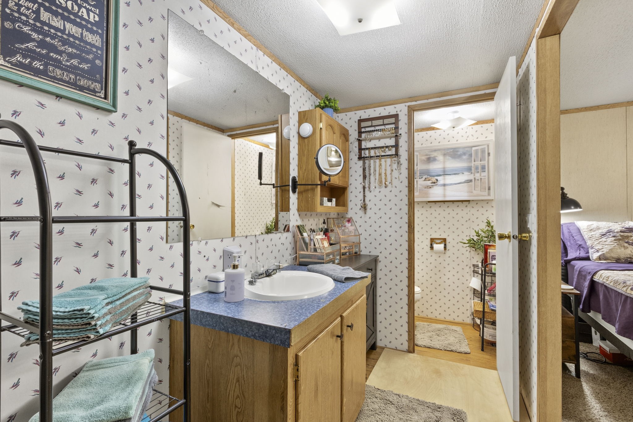 The private primary bathroom features a tub and shower combination with a separate water closet.