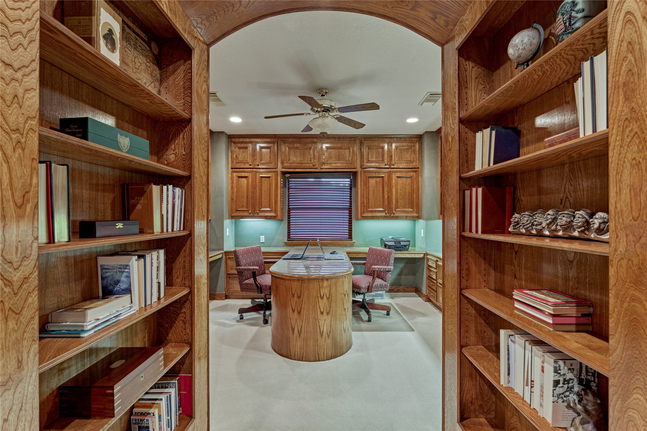 Charming arched entryway into the study.