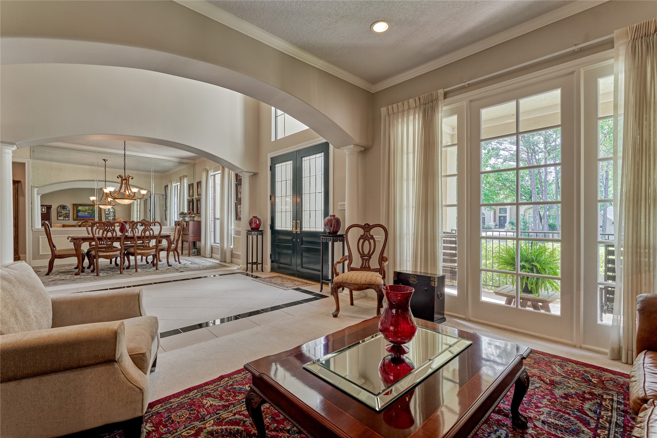 The formal living room offers another inviting space for gatherings, providing an ideal setting for hosting book club or intimate conversations among friends.