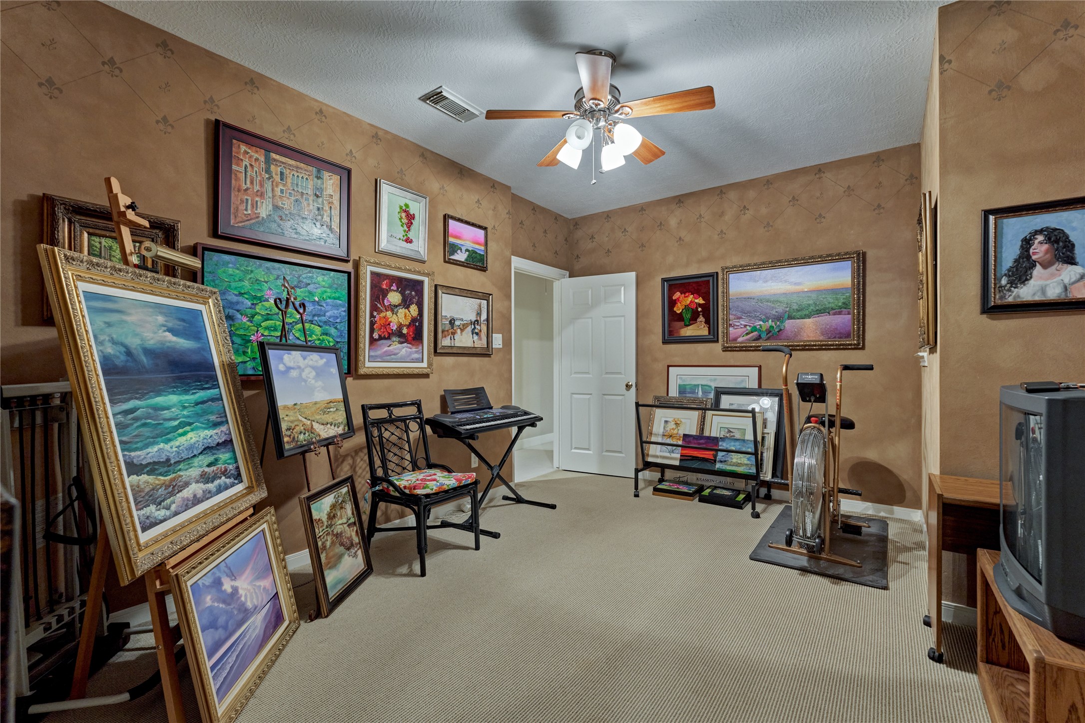 Extra room off hallway could be a workout room.
