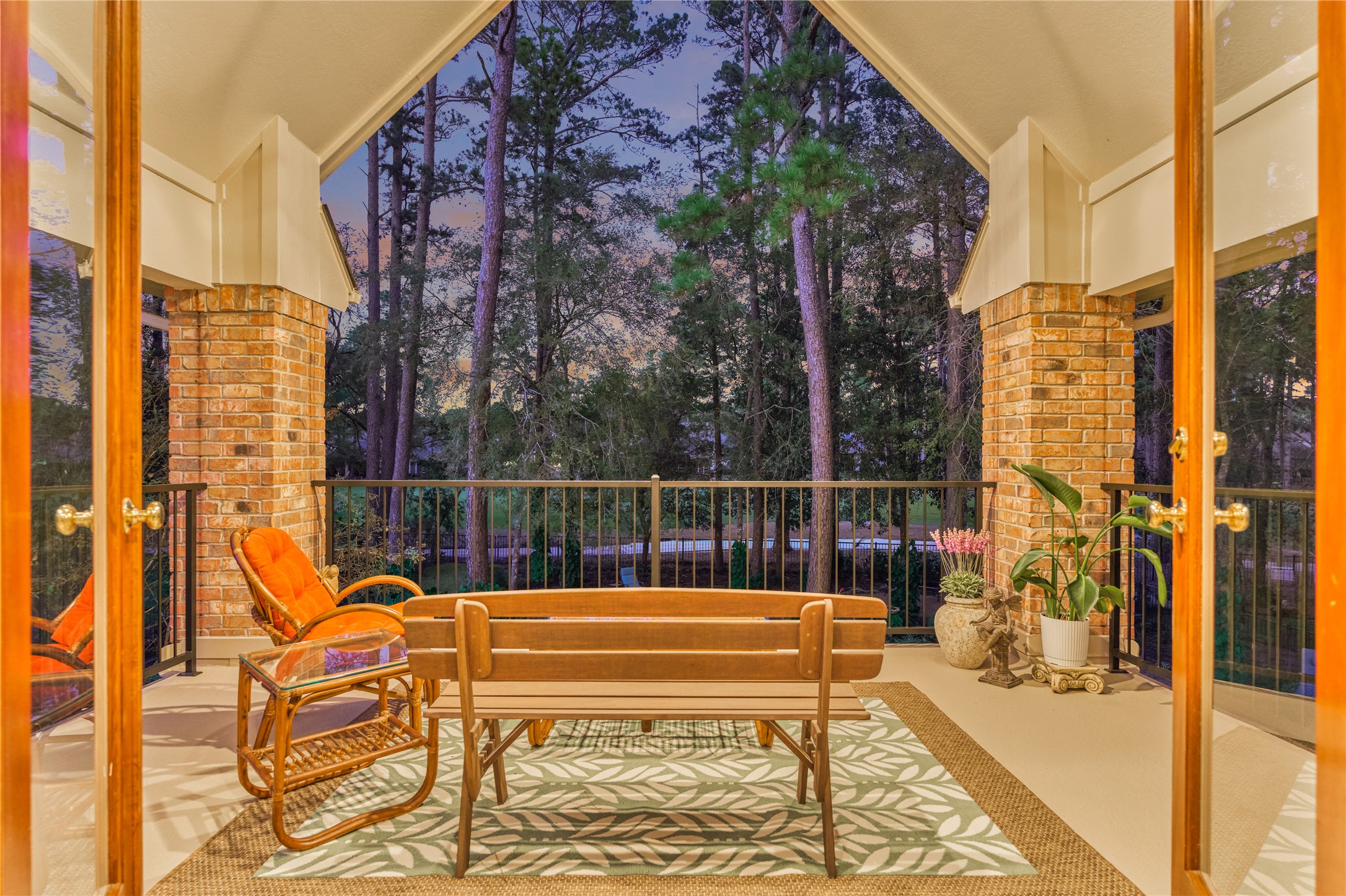 The balcony features amazing views of the poolside paradise and golf course.