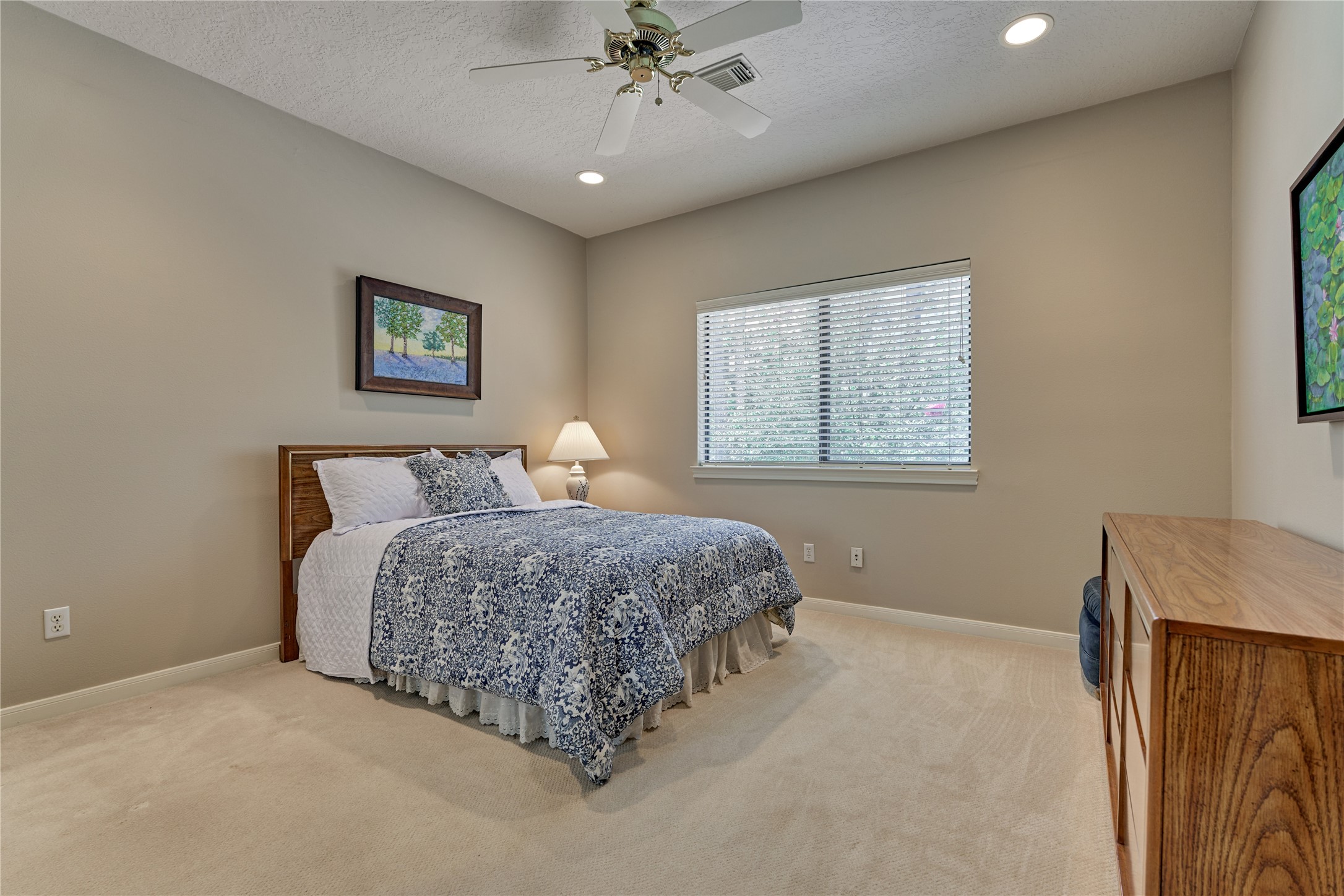 Bedroom #2 overlooks the backyard and shares a bath with bedroom #3.