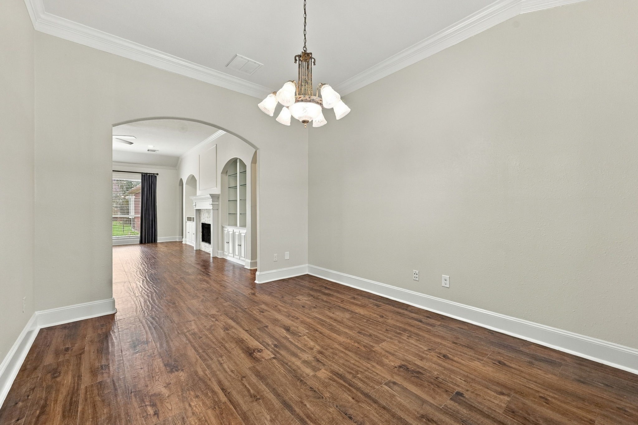From the opposite side of the Formal Dining area, youll appreciate the open flow into the spacious Family Room, with easy access to the Kitchen, creating a seamless layout that is ideal for everyday living and entertaining.