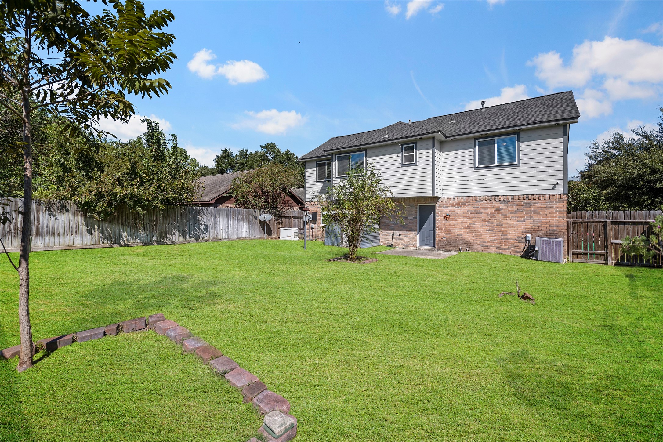 Plenty of Backyard space with Garage access