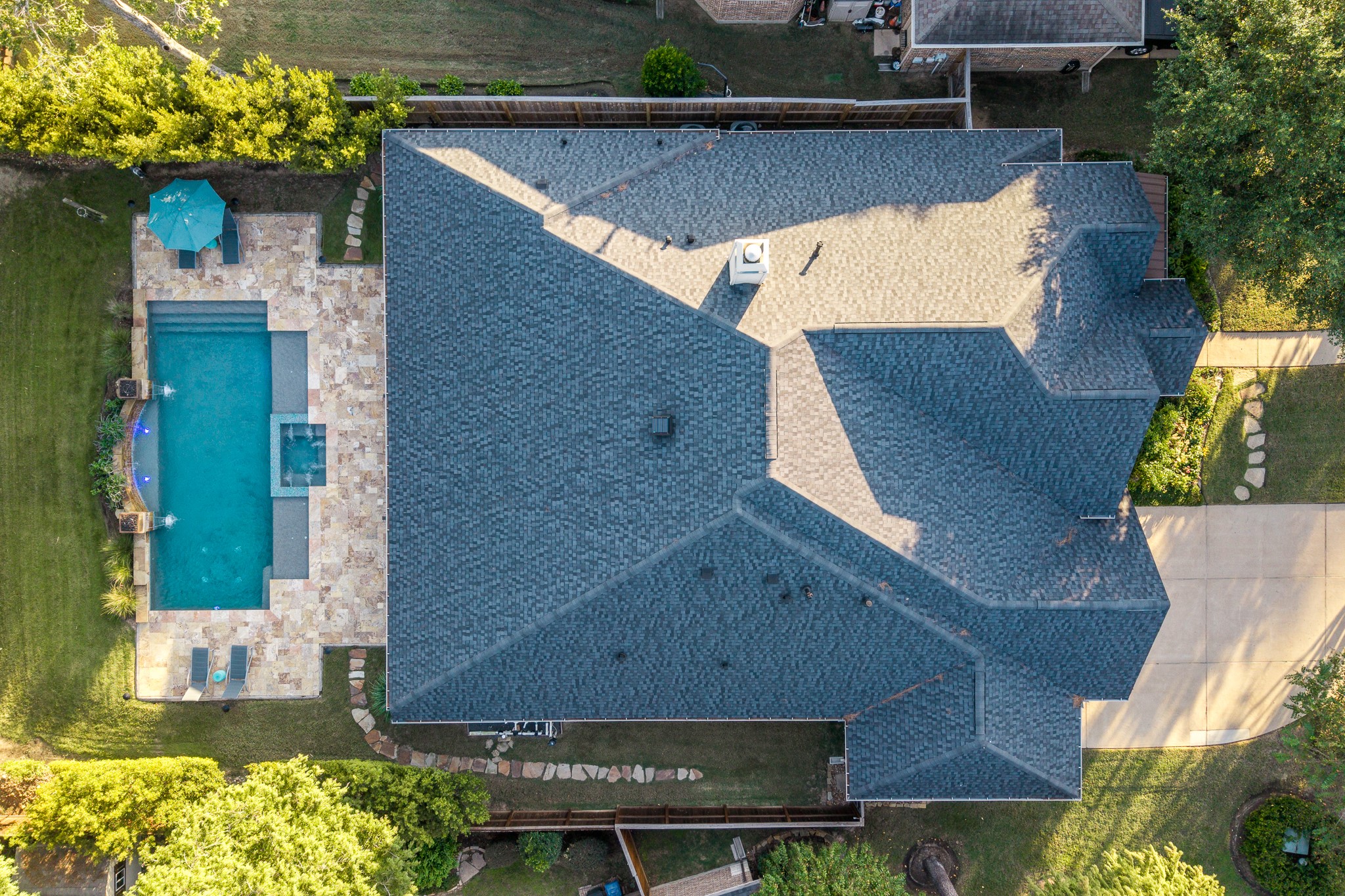 A Breathtaking Aerial View of Luxury Living! Discover the beauty of this exceptional residence from above, showcasing its impressive architectural design, new roof installed in 2024, and spectacular resort-style backyard oasis.Surrounded by mature trees in the prestigious gated community of White Oak Lake Estates, this beautiful property offers the perfect blend of elegance, privacy, and everyday luxury!