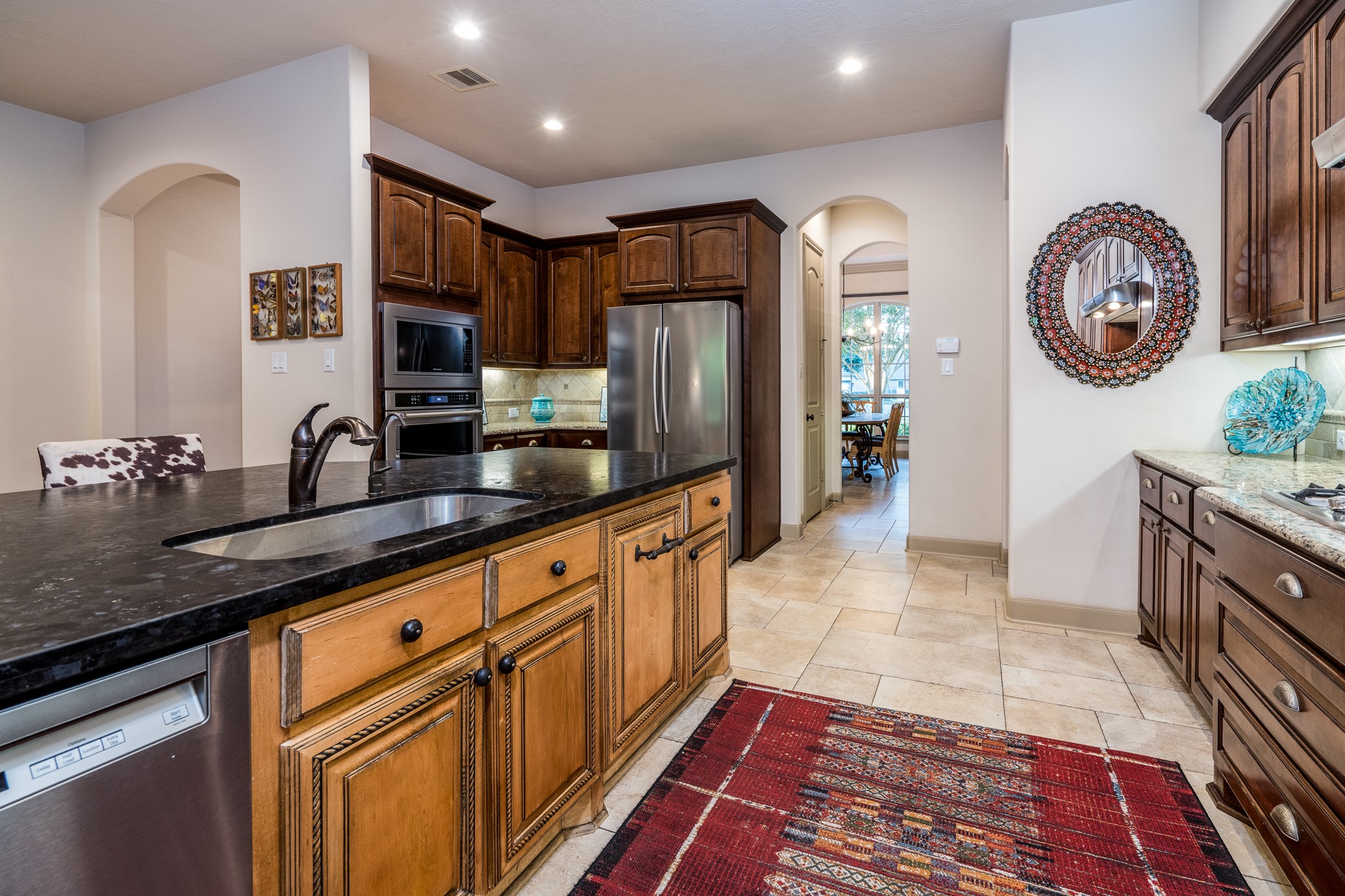Thoughtfully designed for both everyday living and effortless entertaining, this sophisticated space is truly the heart of the home!