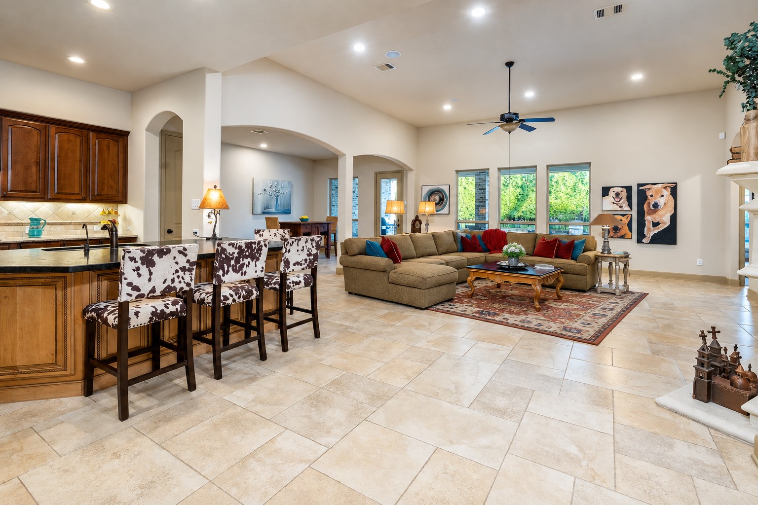 Where everyday moments become cherished memories! This spacious, light-filled breakfast room offers the perfect setting for morning coffee, casual family meals, and lively conversations. Seamlessly connected to the expansive family room and kitchen, its open design creates an inviting atmosphere for effortless entertaining, while beautiful views of the private backyard pool oasis bring a touch of resort-inspired living to every day.