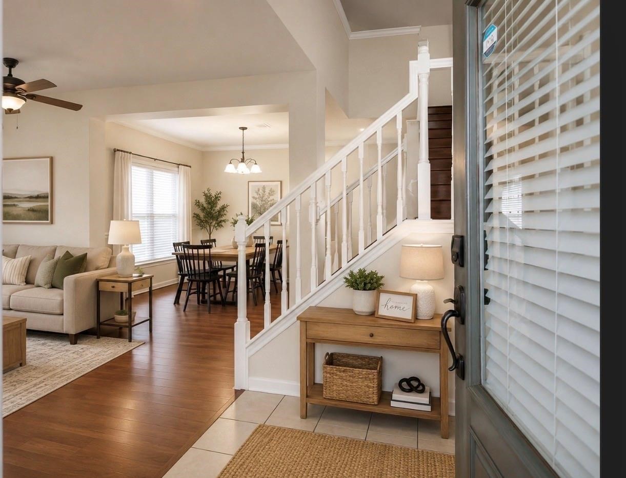 Beautifully updated home has been virtually staged to showcase the downstairs living space as you enter the front door. '
