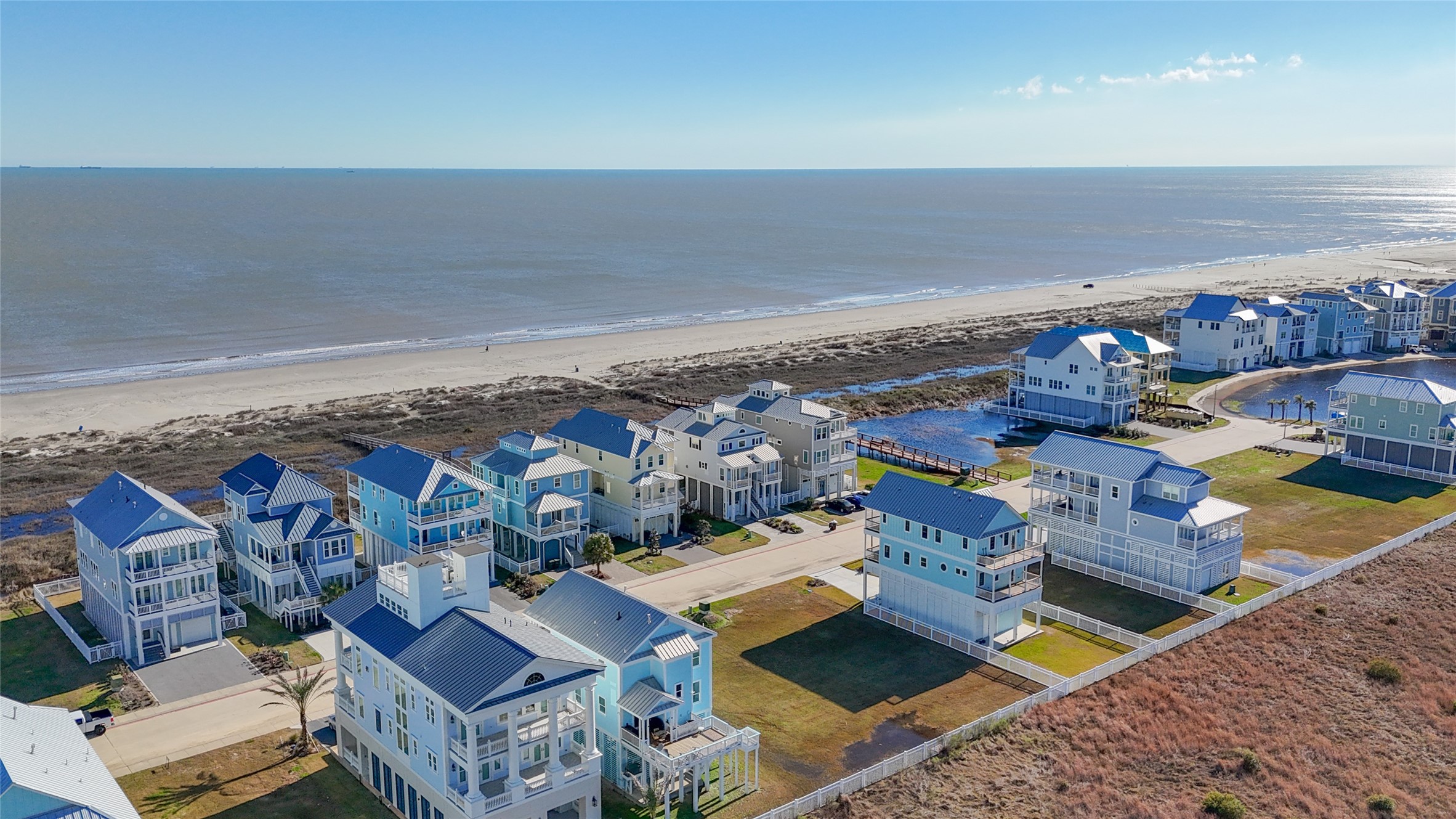This elevated coastal view emphasizes the neighborhoods remarkable proximity to the Gulf of Mexico and the quiet stretch of beach serving The Preserve at Grand Beach. The homesite sits in the second row behind established coastal residences, allowing a future elevated home to take advantage of its seaside setting without occupying a direct beachfront parcel. Dedicated community walkover access makes reaching the sand and surf especially convenient. This elevated coastal view emphasizes the neighborhoods remarkable proximity to the Gulf of Mexico and the quiet stretch of beach serving The Preserve at Grand Beach. The homesite sits in the second row behind established coastal residences, allowing a future elevated home to take advantage of its seaside setting without occupying a direct beachfront parcel. Dedicated community walkover access makes reaching the sand and surf especially convenient.