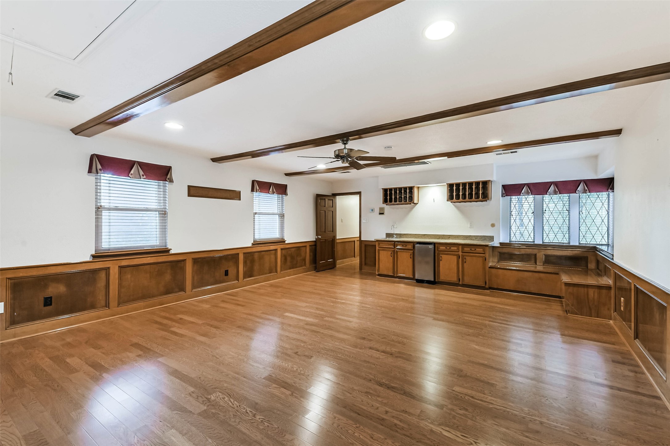 Large game room/ media room above garage, accessed from second staircase in kitchen and living room.